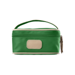 A kelly green colored Jon Hart mini makeup case with natural leather trim and a leather patch for personalization.