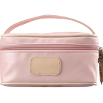 A rose colored Jon Hart mini makeup case with natural leather trim and a leather patch for personalization.