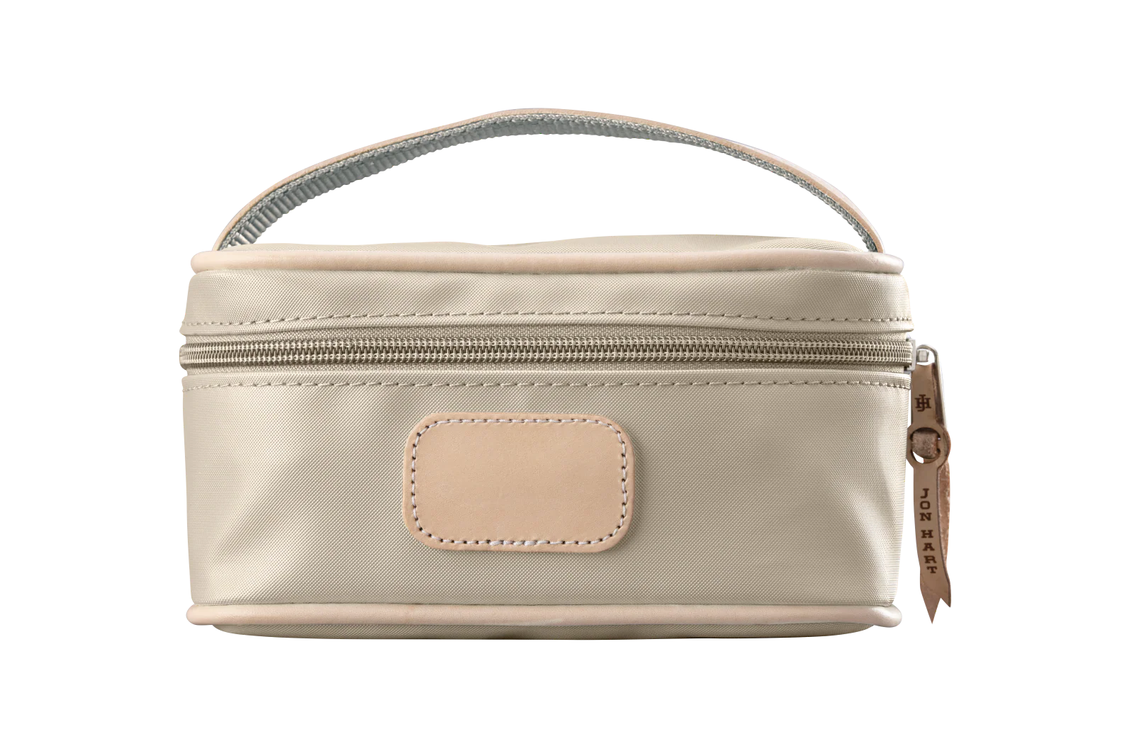 A tan colored Jon Hart mini makeup case with natural leather trim and a leather patch for personalization.