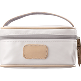 A white colored Jon Hart mini makeup case with natural leather trim and a leather patch for personalization.