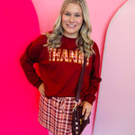 Plaid fall skort with built-in shorts, drawstring waist, and side pockets