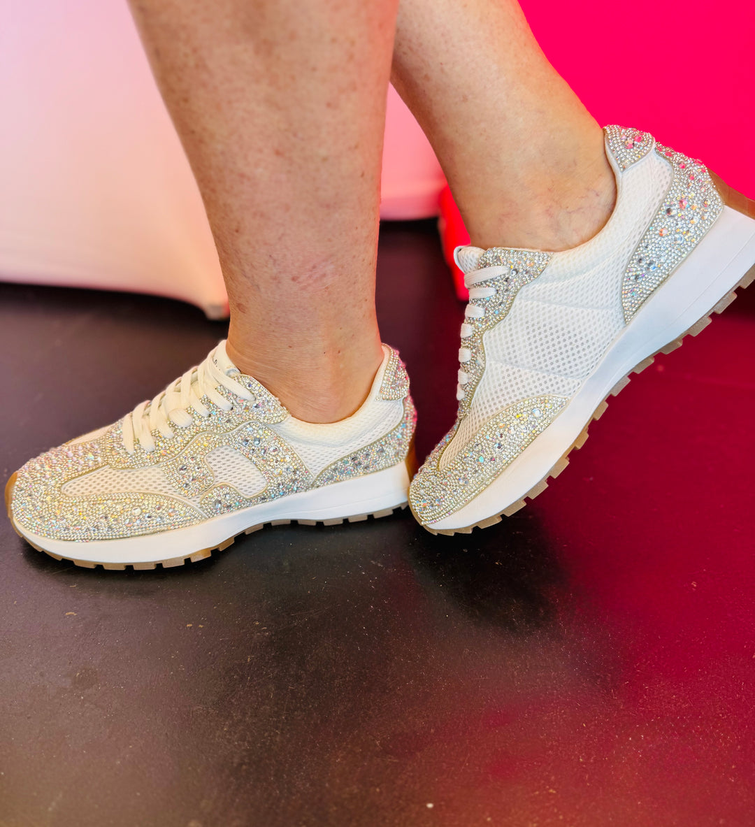 Detailed view of Corky's rhinestone-covered mesh sneakers showing sparkle and lace-up closure.