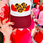 Maroon and white cap with leopard winged heart yarn patch and adjustable snapback.