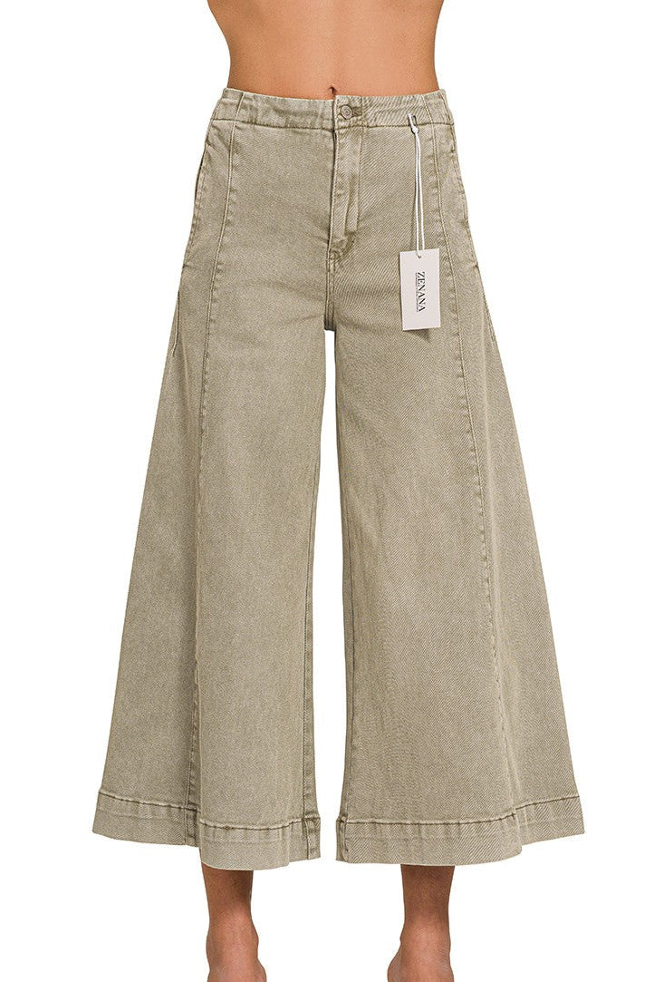 Light olive high-rise cropped gaucho denim jeans.