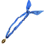 Royal blue scarf necklace with football charm.