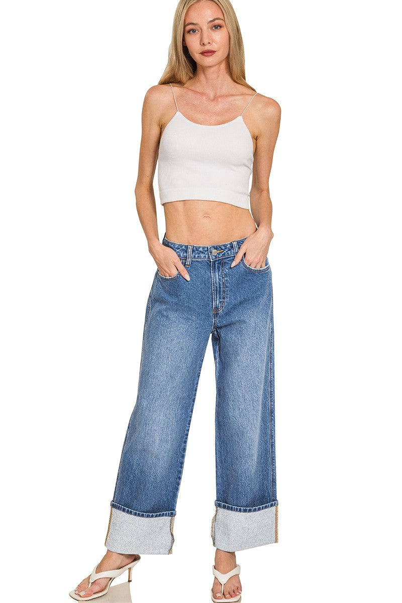 High-rise cuffed wide-leg denim pants with wide cuffs, 11-inch rise, and flattering relaxed silhouette.