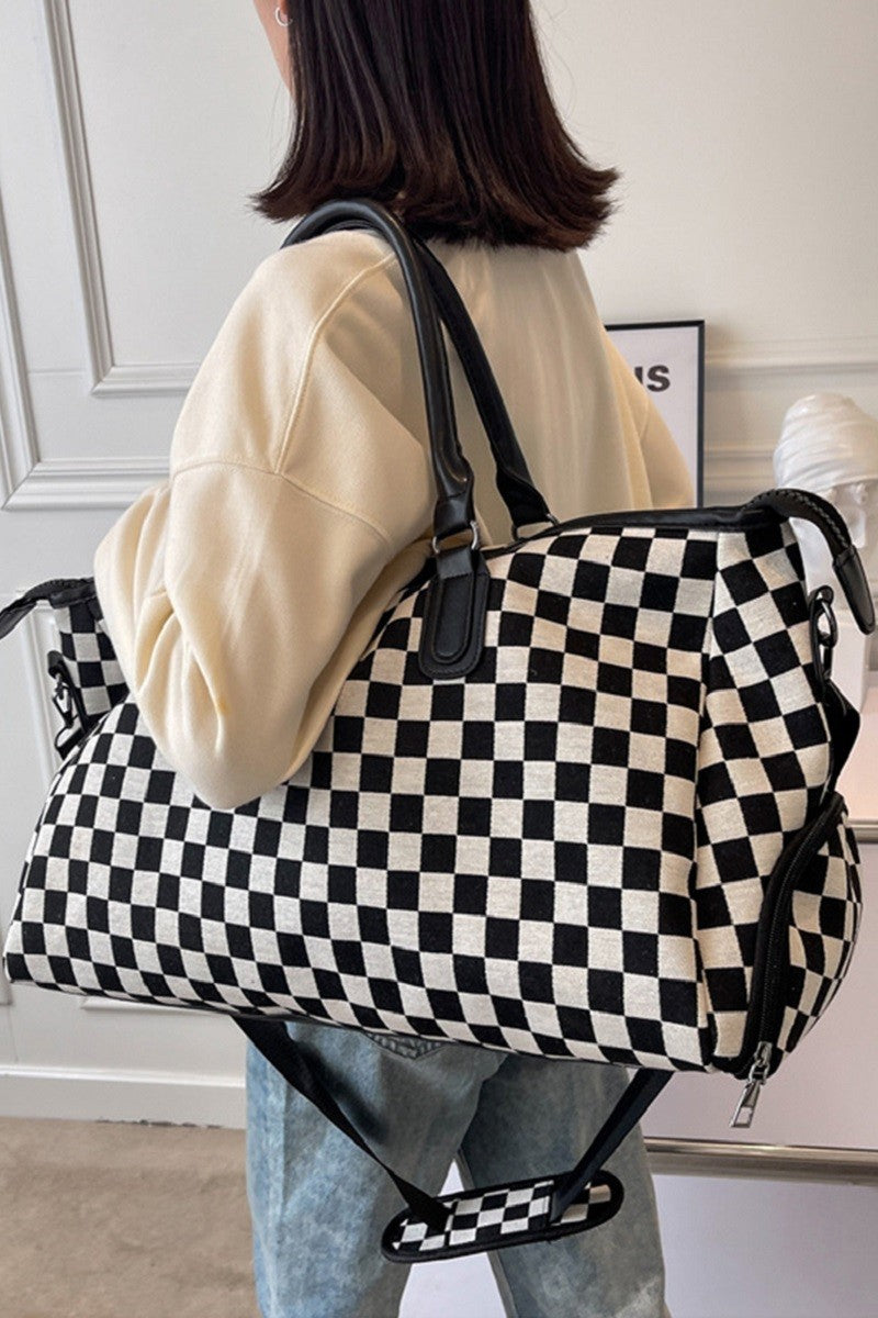 Black Checkered Canvas Weekender Duffle Bag with side shoe compartment, waterproof material, and adjustable strap