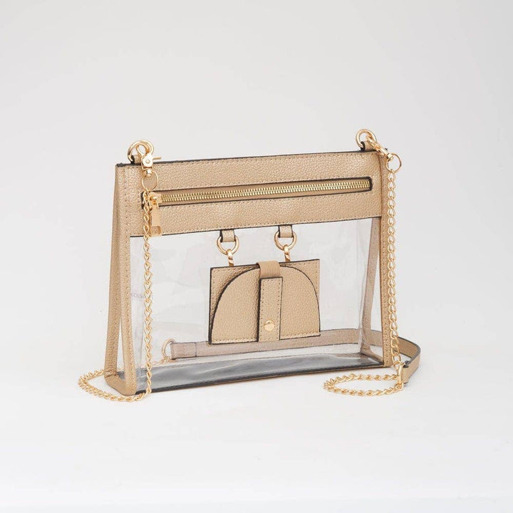 Clear crossbody bag with shimmering gold trim and matching hardware, featuring a detachable sunglasses holder—elegant and event-ready.