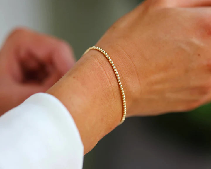 Bara Boheme Delicate 14K gold filled beaded bracelet with 2mm beads. 