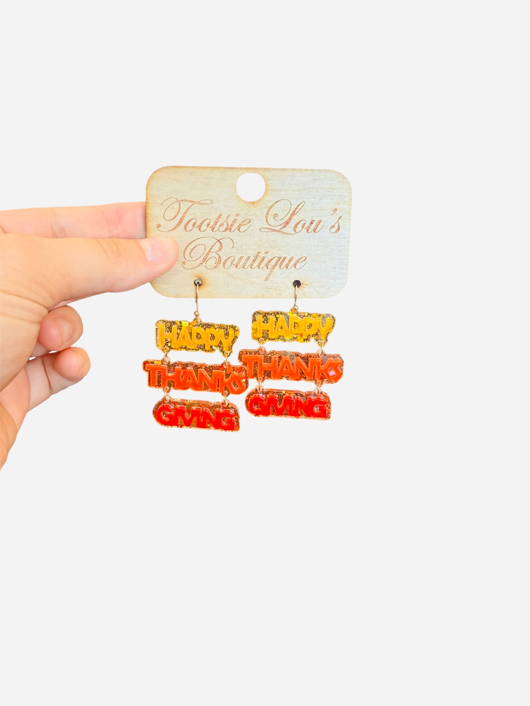 acrylic dangle earrings, happy thanksgiving, orange, red and mustard yellow letters. 