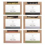 Six packages of all-natural bar soap with different scents from Rowe Casa Organics
