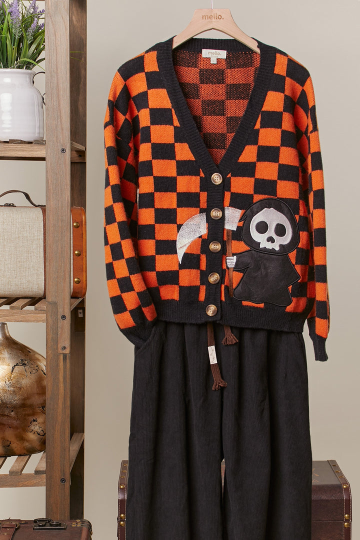 Orange & Black Checkered Reaper Patch Cardigan with soft knit and bold, super fun Halloween design.