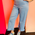 Ocean mist striped ruffled hem pants with high-rise waist and straight-leg silhouette.