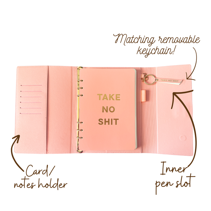 Inside view of pink magnetic closure journal folio and calendar with gold graphics.