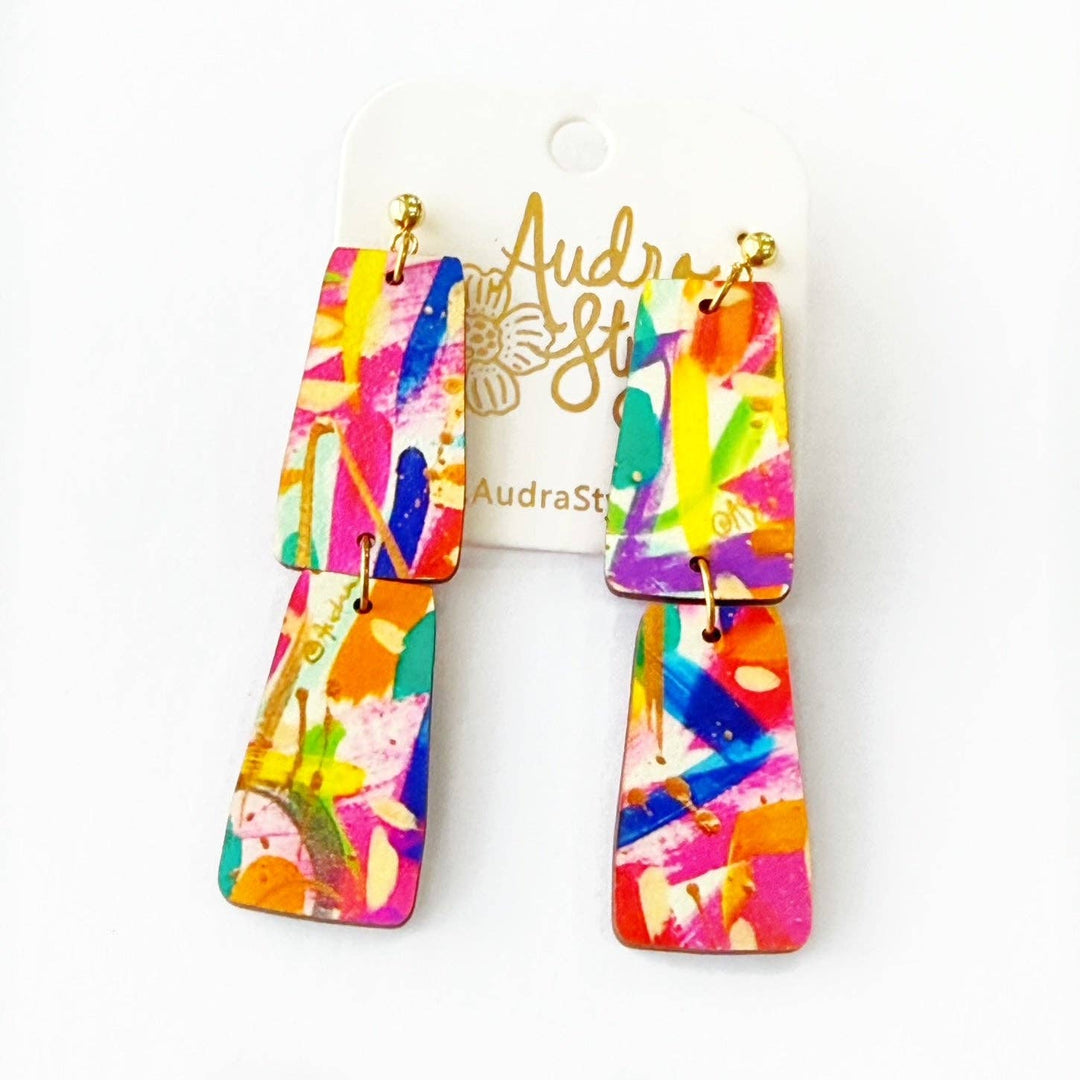 Colorful abstract patterned earrings from Audra Style branding.