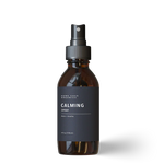 Calming essential oil spray with tangerine, orange, ylang ylang, patchouli, and blue tansy.