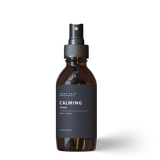 Calming essential oil spray with tangerine, orange, ylang ylang, patchouli, and blue tansy.