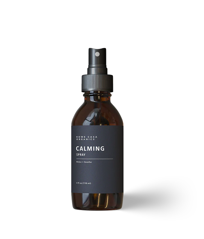 Calming essential oil spray with tangerine, orange, ylang ylang, patchouli, and blue tansy.