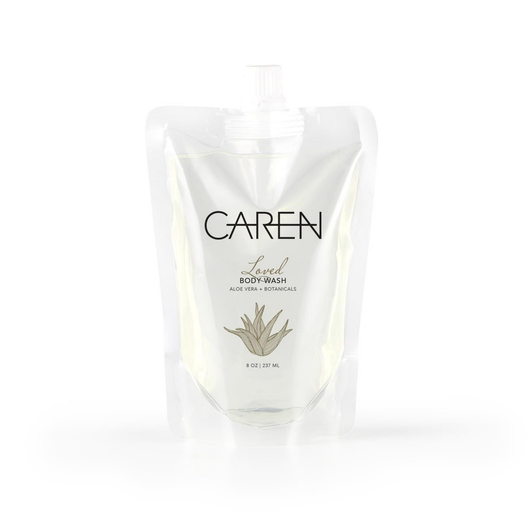 An 8oz biodegradable pouch of "Loved" body wash. 
