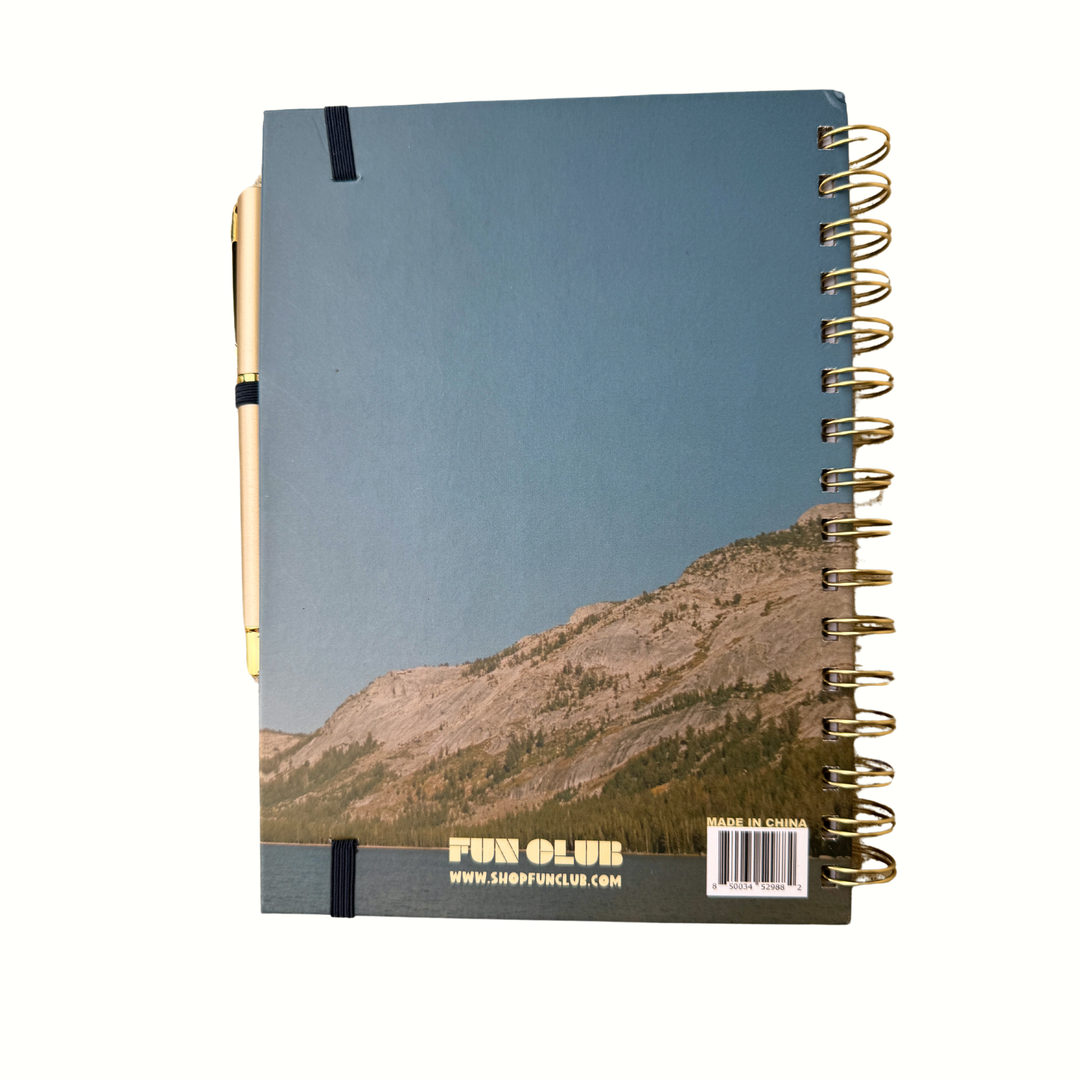 Blue hardcover journal that features mountains with a lake A5 size, 140 pages.