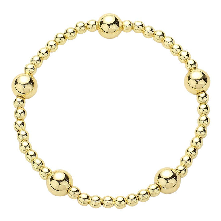 Waterproof stainless steel 4mm gold beaded bracelet with 8mm gold bead accent.