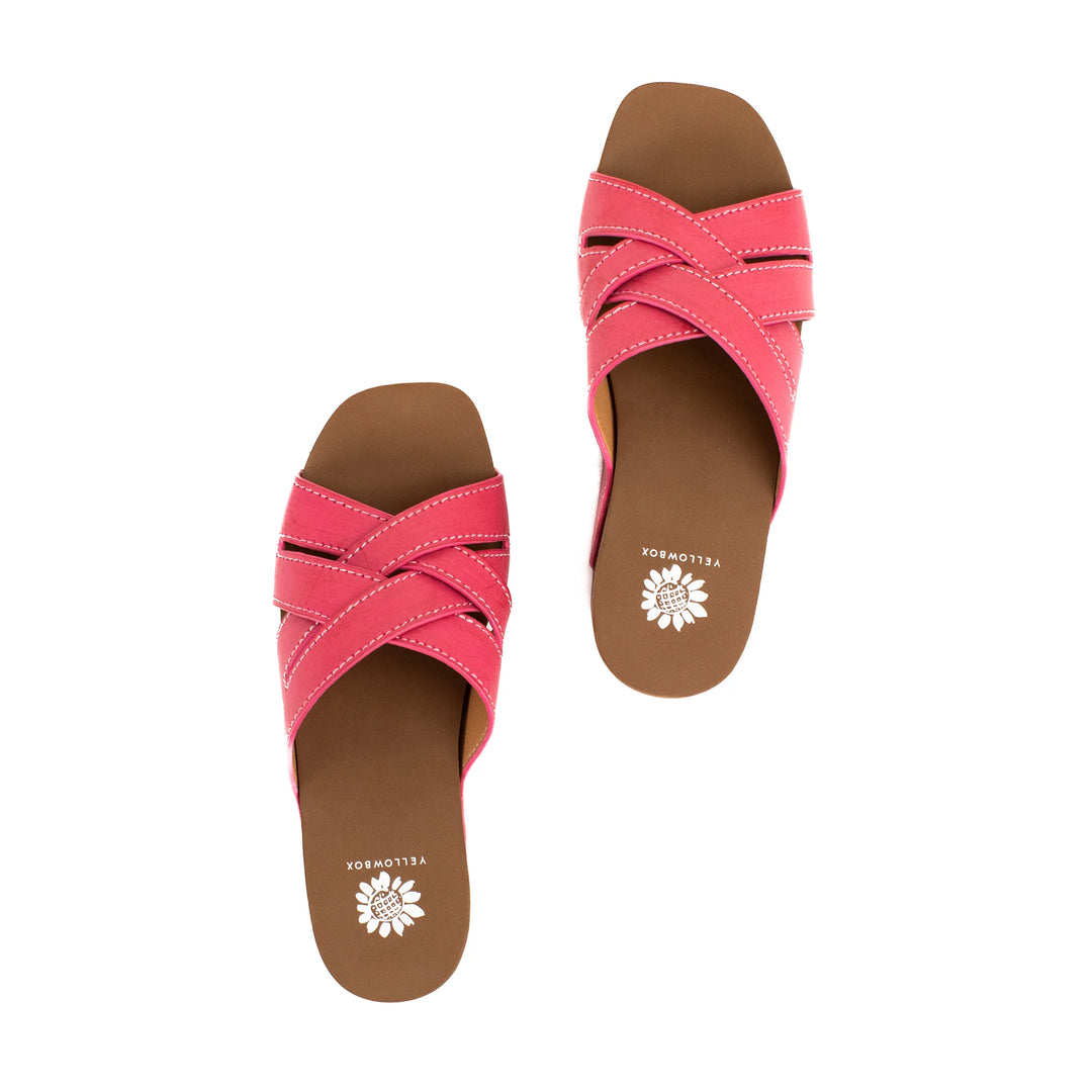 Cork wedge sandal with square toe, 2.75-inch heel, 1.25-inch platform, and EVA footbed.