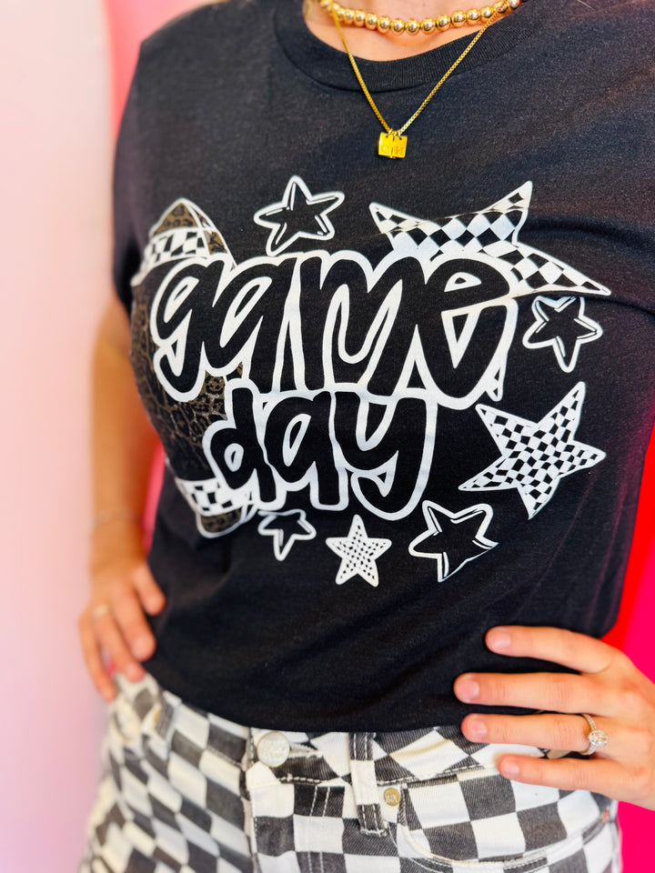 Black t-shirt with 'Game Day' graphics.
