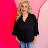 Black scalloped V-neck top with collar and 3/4 sleeves, made from soft, lightweight stretch fabric.