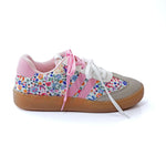 Brown and white sneakers with pink laces and a floral print design.