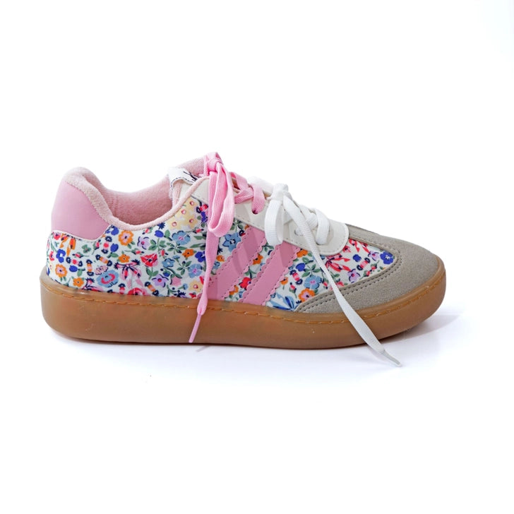 Brown and white sneakers with pink laces and a floral print design.