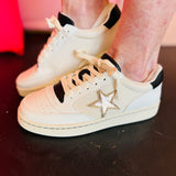 Yellow Box Cardona white and black sneakers with metallic gold star applique and cushioned insole.