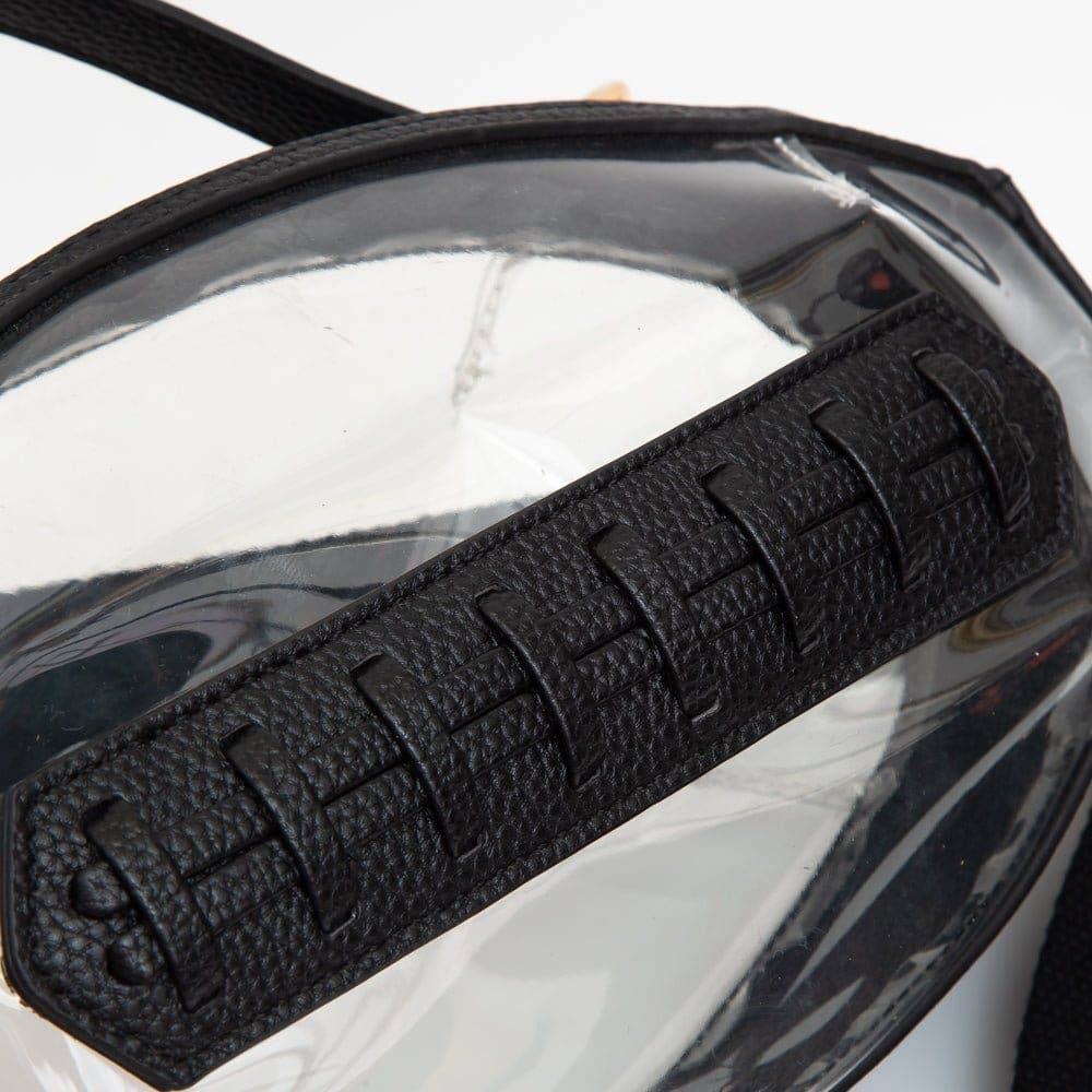 Football stitching on a clear football-shaped crossbody bag with black trim