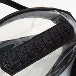 Football stitching on a clear football-shaped crossbody bag with black trim