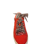 Front view of red embellished sneakers with leopard lace-up detail, close round toe, and rhinestone star accents on the sides.