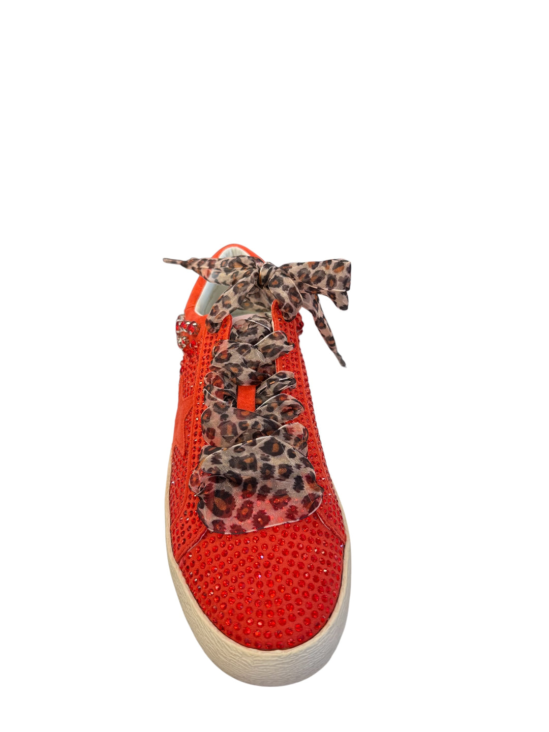 Front view of red embellished sneakers with leopard lace-up detail, close round toe, and rhinestone star accents on the sides.