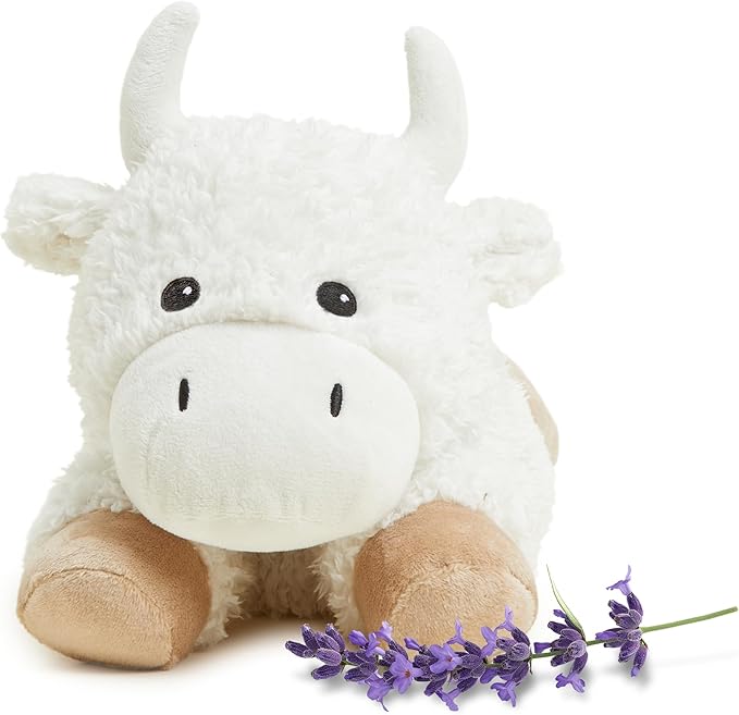 Plush white buffalo Warmies, lavender scented, microwavable, and weighted for warmth and comfort.