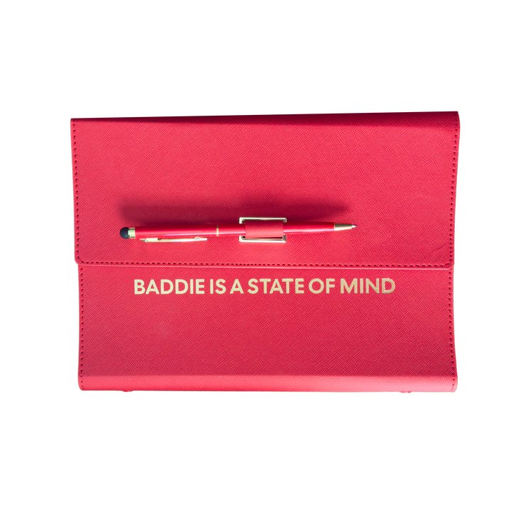 Red clutch organizer with a pen and 'Baddie is a State of Mind' text.