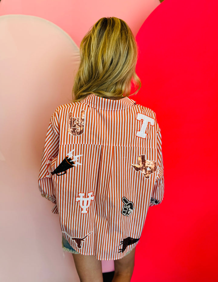 Back of Queen Of Sparkles orange and white striped icon University Of Texas game day blouse.