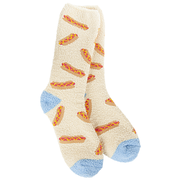 A pair of plush, soft crew socks with a repeating all-over pattern of hot dogs. The socks feature a solid, contrasting blue color on the heels and toes.