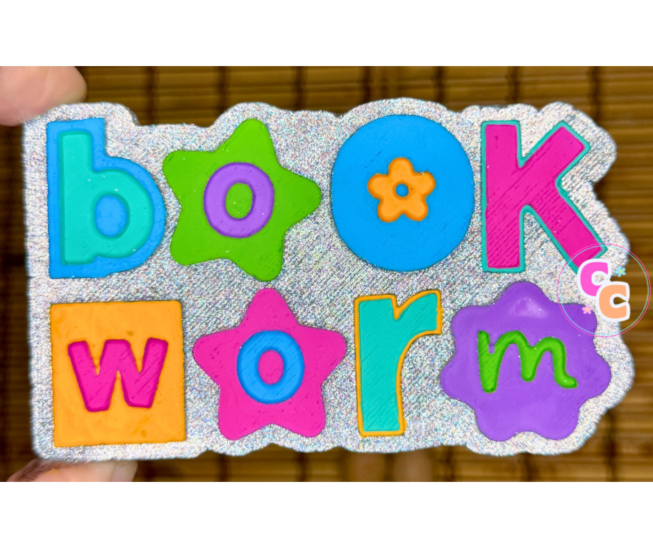 90s Bookworm freshie with colorful retro lettering and flower details.
