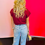 Back view of the jeans showing traditional back pockets and a contoured fit that enhances the silhouette.