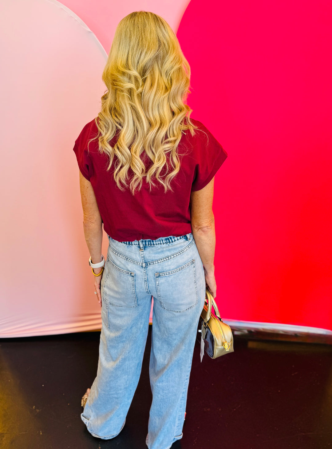 Back view of the jeans showing traditional back pockets and a contoured fit that enhances the silhouette.