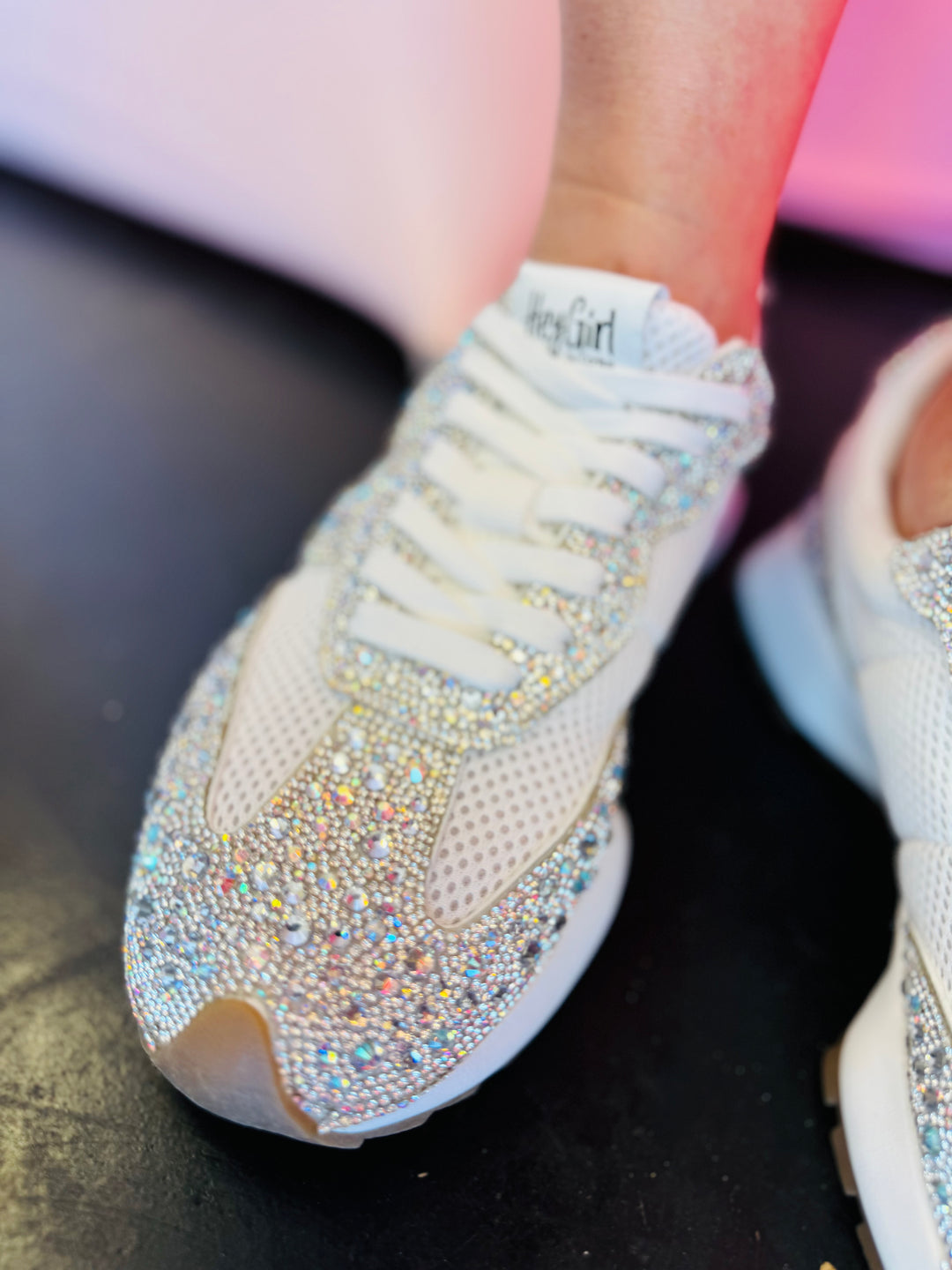 Detailed view of Corky's rhinestone-covered mesh sneakers showing sparkle and lace-up closure.