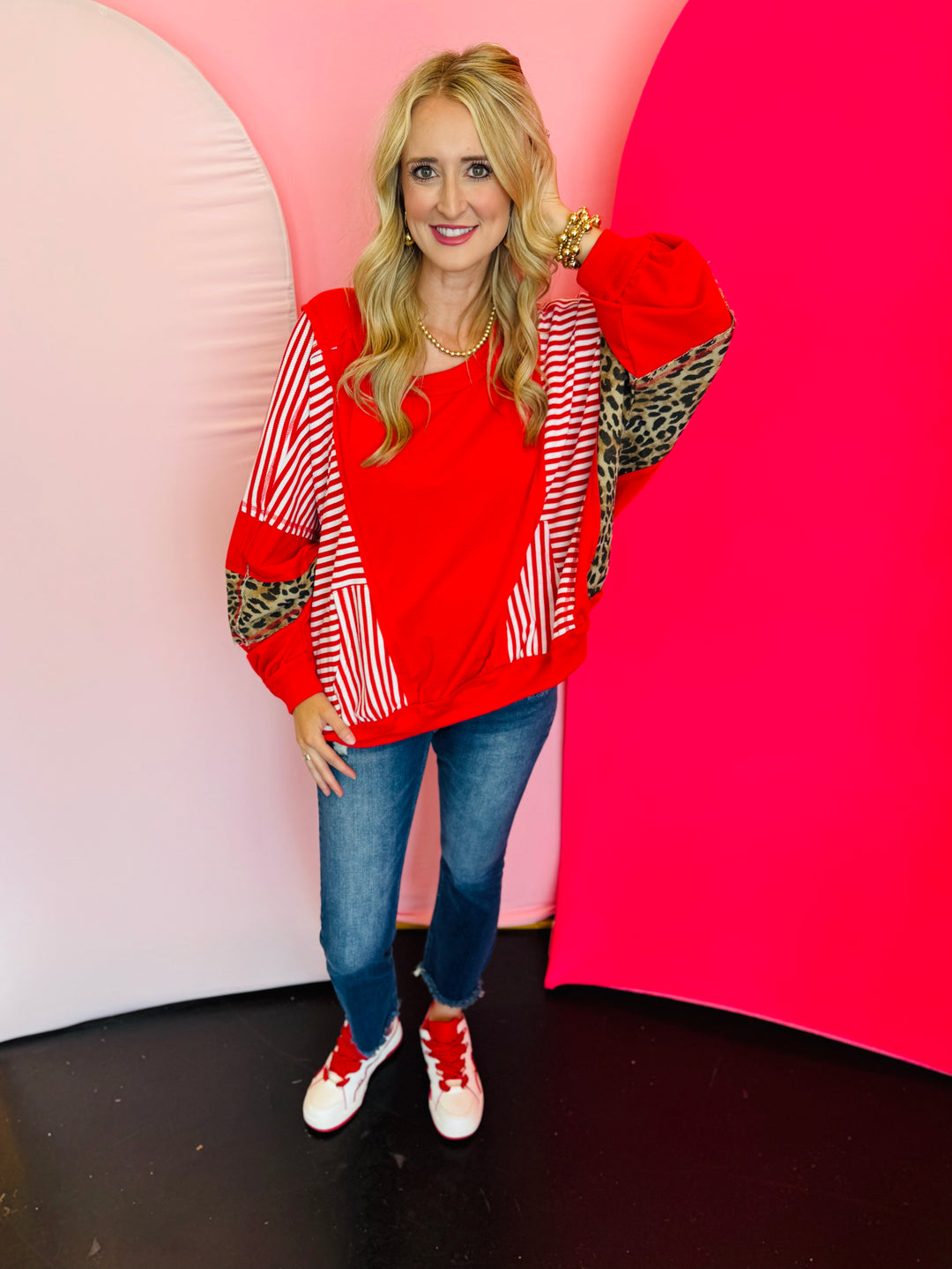 Red, stripe, and leopard oversized Dolman style long sleeve sweatshirt.