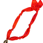 Red satin scarf necklace with a black rhinestone encrusted football charm.