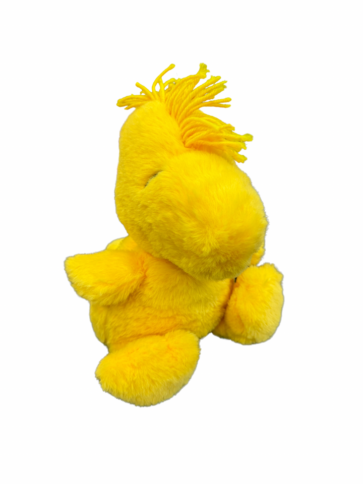 Woodstock Warmies® plush, microwavable and lavender-scented, weighted for comfort, safe for all ages.