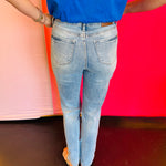 Back view of Judy Blue Contrast Wash Straight Jeans showing pocket placement and full-length straight leg cut designed to enhance and flatter the figure.