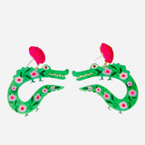 Green floral alligator earrings with hot pink beaded studs.
