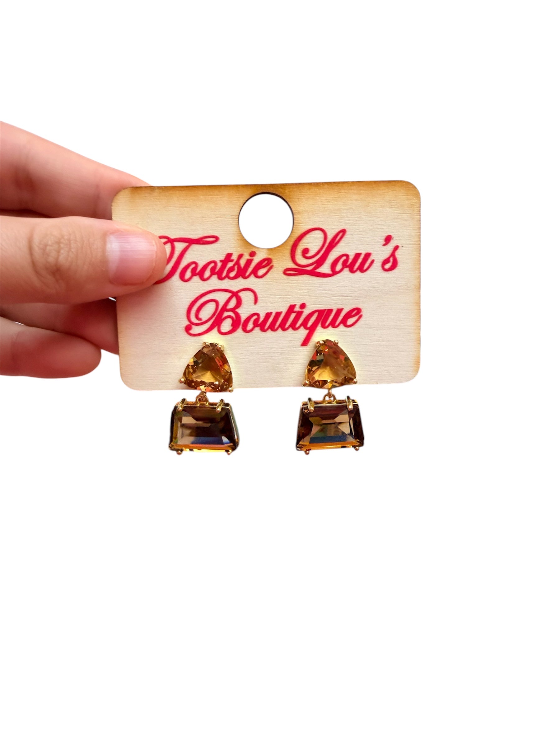 Amber geometric drop earrings with honey-brown triangle gemstones and sparkling rectangular crystal drops.
