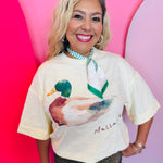 Cream oversized top with watercolor mallard duck graphic and relaxed fit.